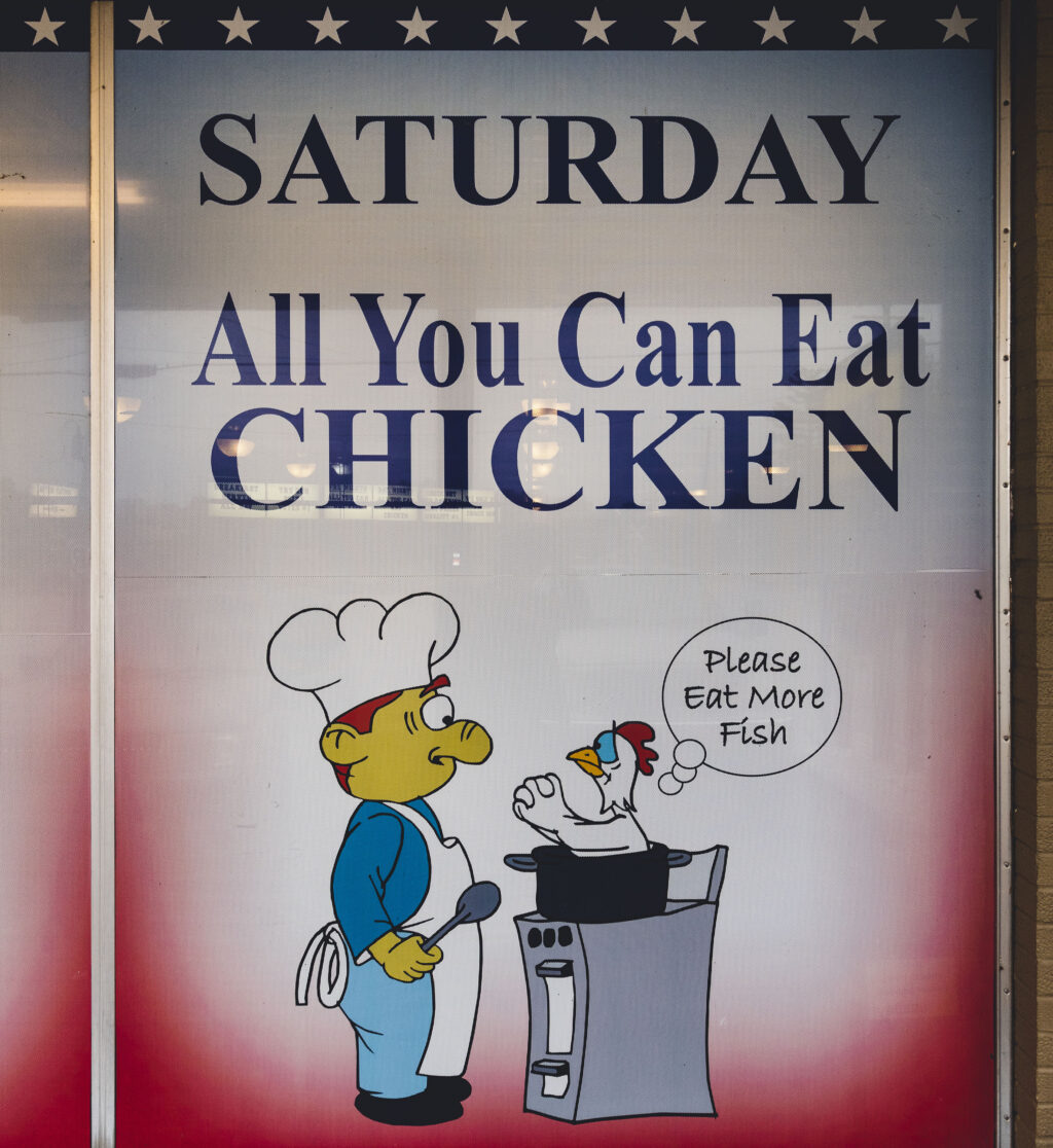 Sign showing "Saturday All You Can Eat Chicken" at Liberty Bell Family Restaurant.