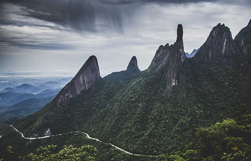 View of mountains from Mirante Cartão Postal in Serra dos Órgãos National Park, Teresopolis, Brazil.